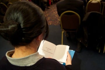 One of the NGO CSW participants reading our booklet